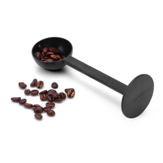Black plastic coffee scoop with integrated tamper feature